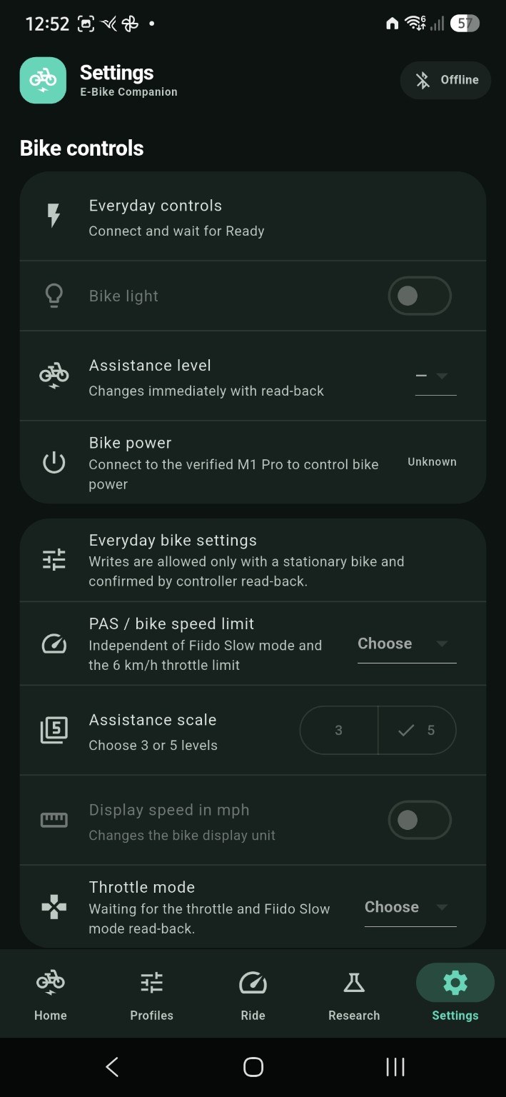 Settings screen showing bike controls and assistance options